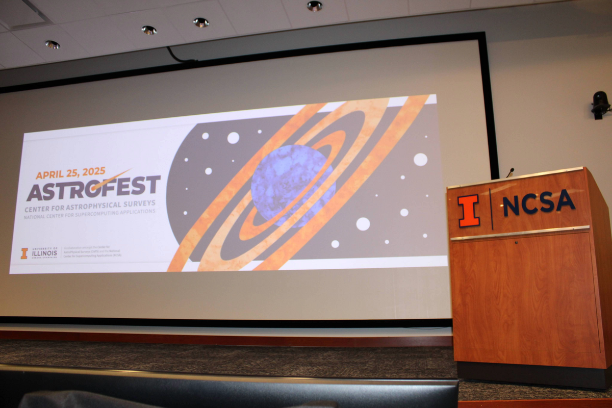 A podium with the block I, NCSA and then the standard slide for Astrofest 2025.