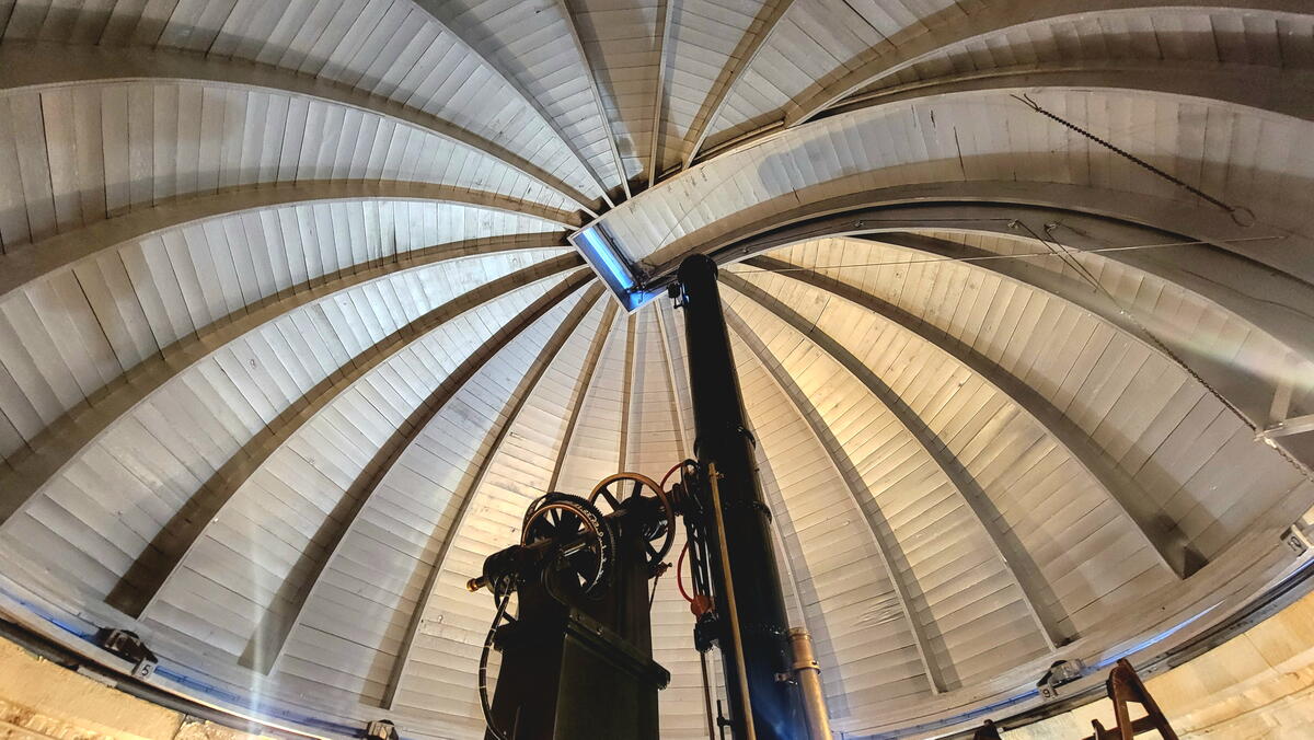 A telescope in an observatory dome