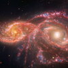 Two galaxies next to each other.