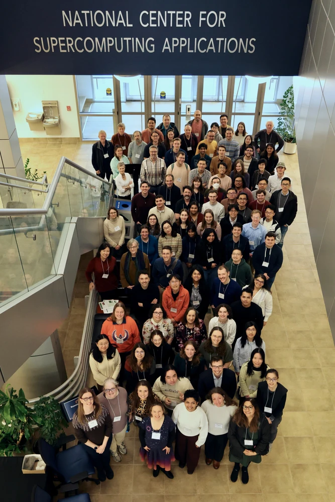 A group of people standing in the lobby of NCSA.