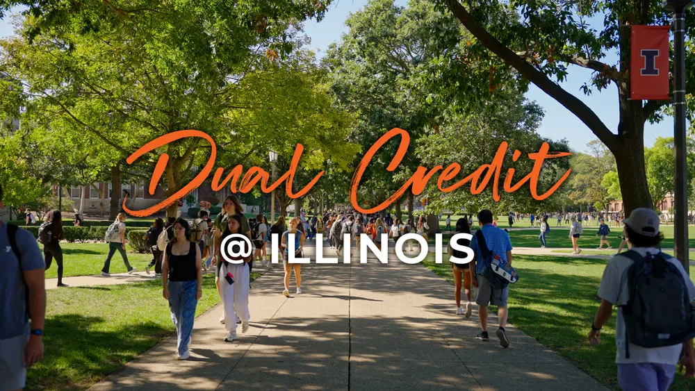 Dual Credit @ Illinois in script letters on top of students walking on the Quad.