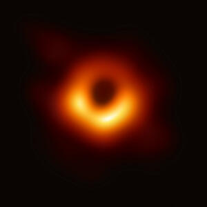 This ring-like structure with a dark central region shows the shadow of the event horizon of the supermassive black hole in galaxy M87.