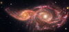 Two galaxies next to each other.